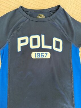 Polo by Ralph Lauren Navy  rash guard with  Blue sides Size 7. Boys girls kids